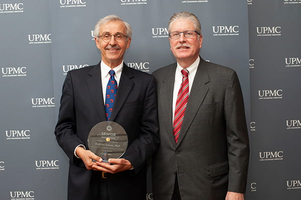 Caregiver champion, Richard Schulz with Scott Lammie